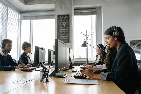 Call center agents supporting customer support quality assurance