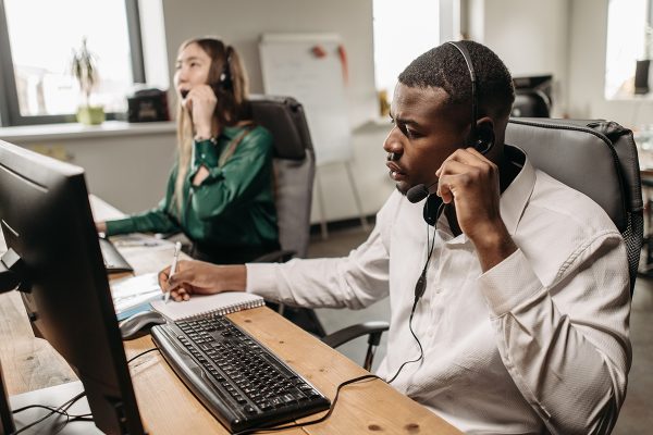 Remote customer support teams assisting customers over phone calls